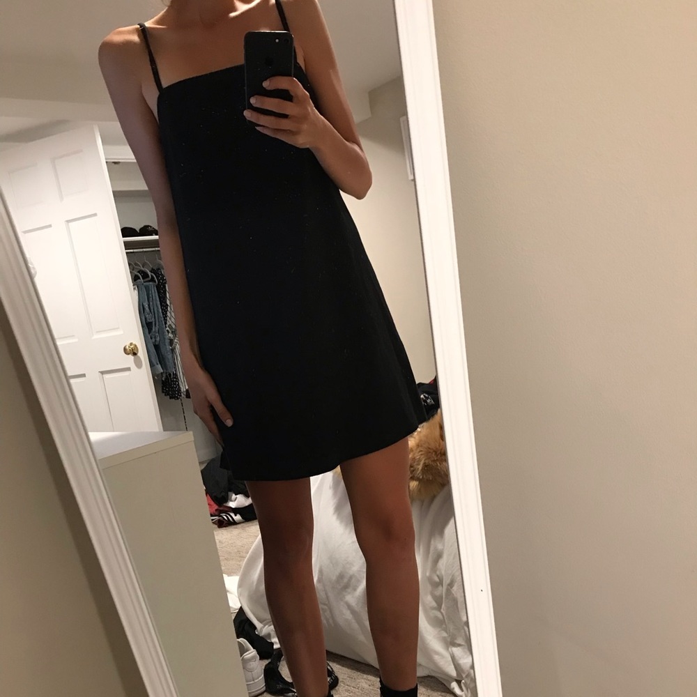 Black spaghetti strap dress.